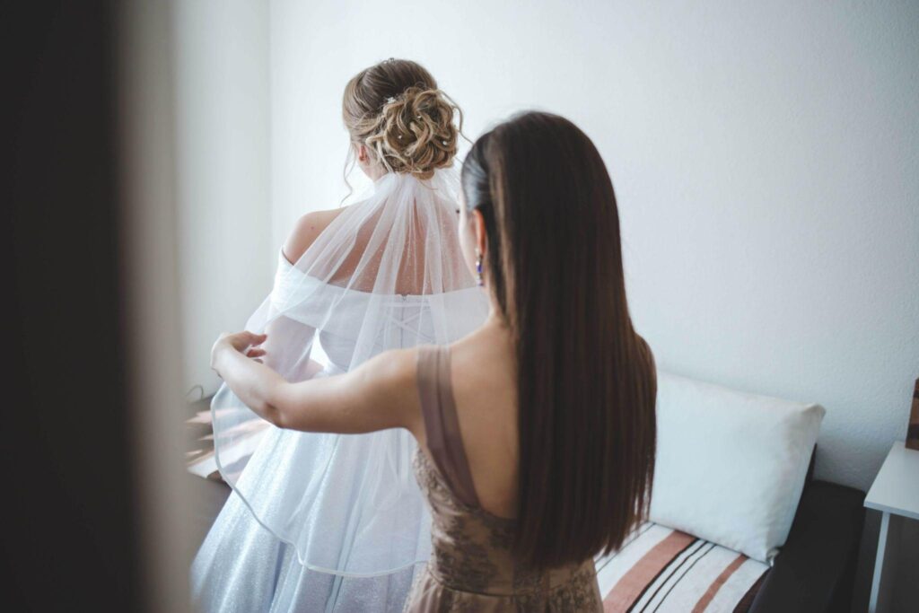 100+ Wedding Photography ideas to capture every moment 11 Bridesmaids arranging the veil