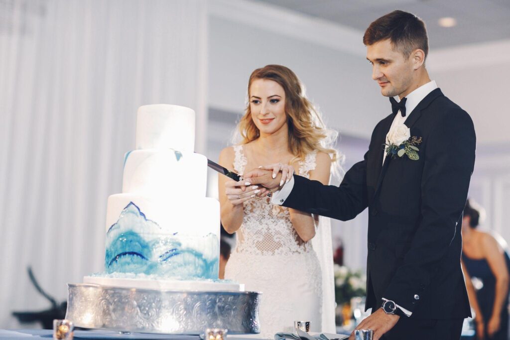 100+ Wedding Photography ideas to capture every moment 79 Couple Cake cutting moment