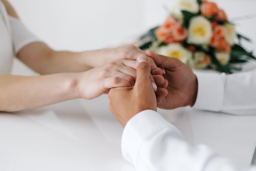 100+ Wedding Photography ideas to capture every moment 31 Couple Holding Hands During Vows