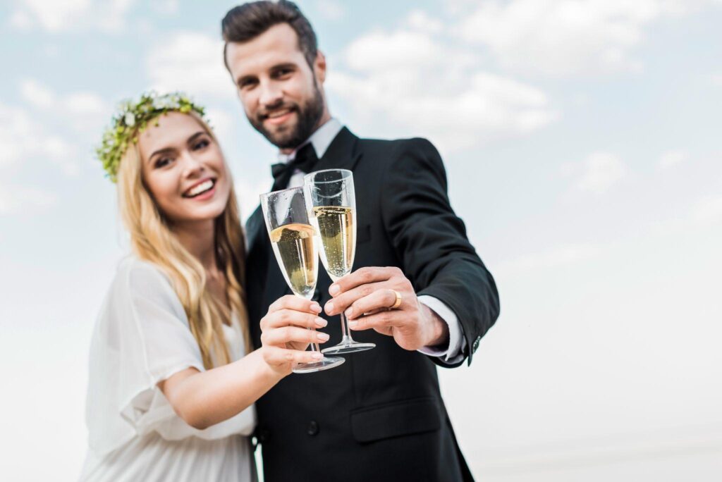 100+ Wedding Photography ideas to capture every moment 81 Couple making a celebratory toast