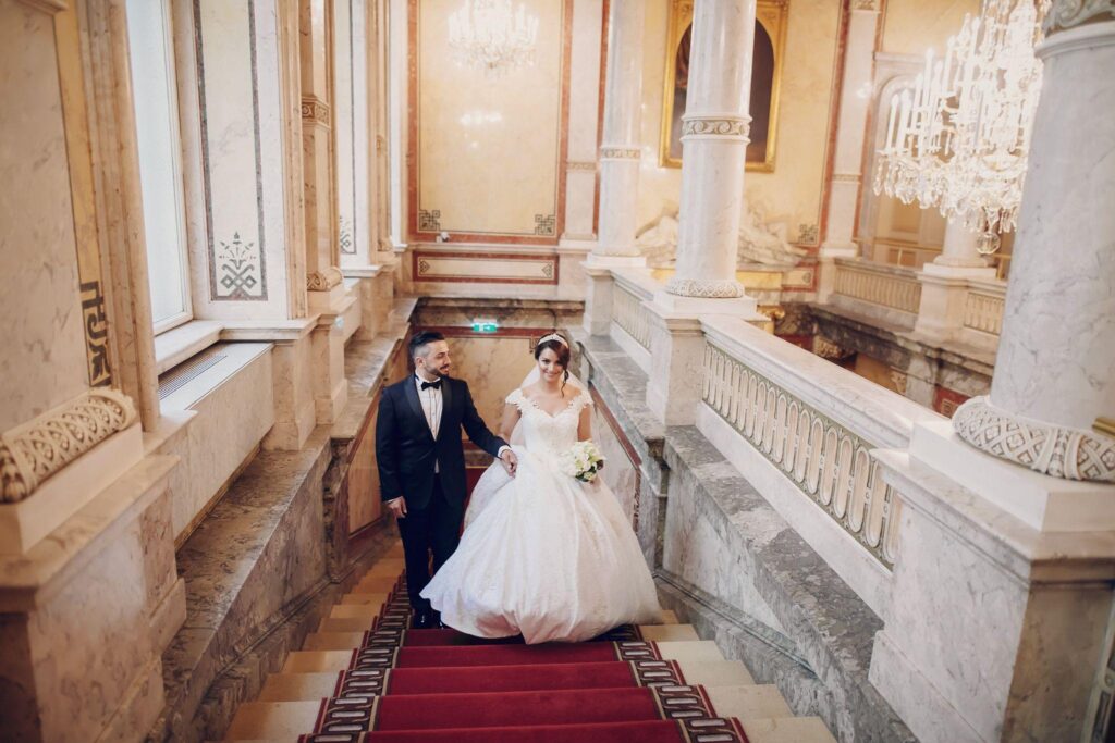 100+ Wedding Photography ideas to capture every moment 54 Couple posing on grand staircase