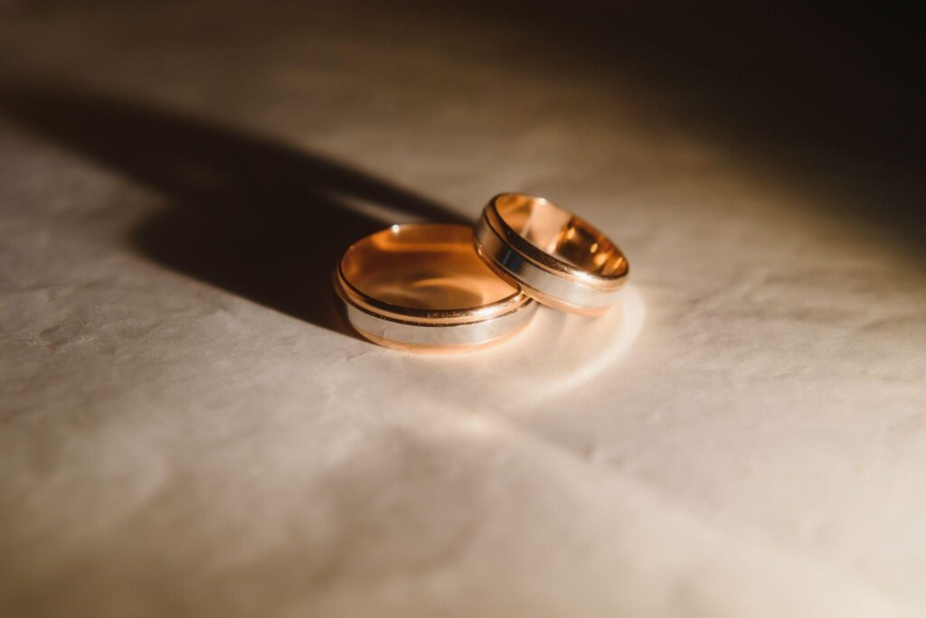 100+ Wedding Photography ideas to capture every moment 46 Couple rings shot in golden hour