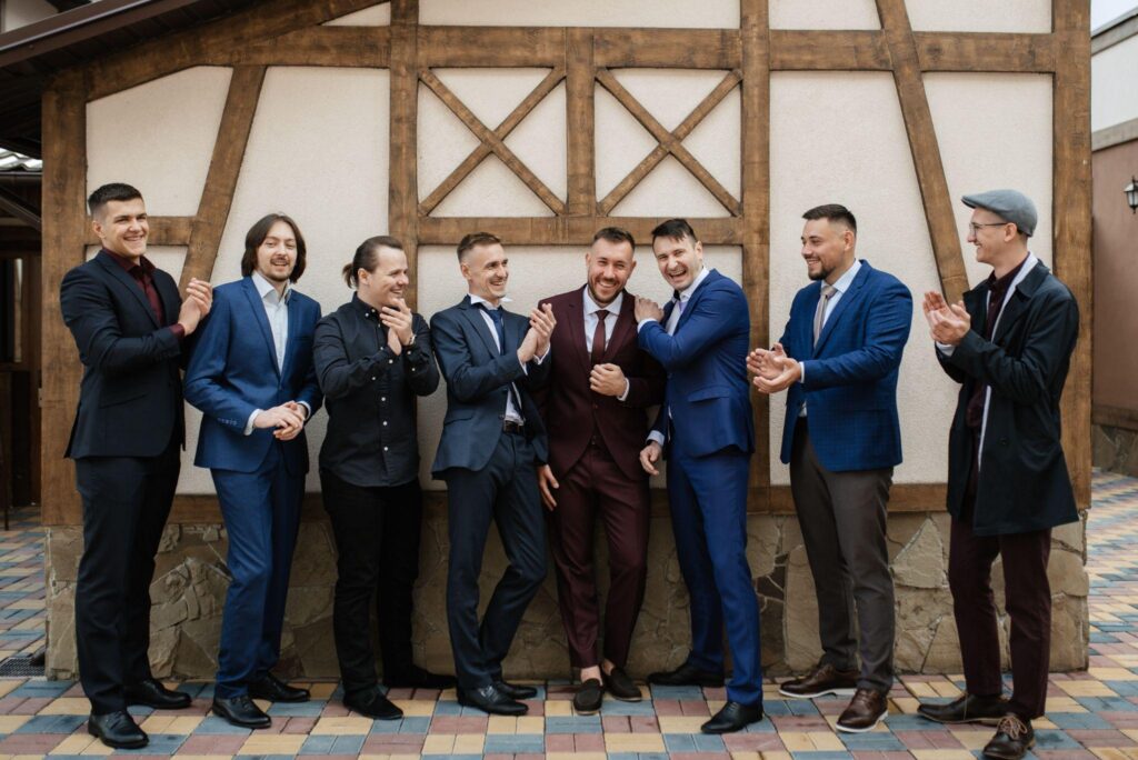 100+ Wedding Photography ideas to capture every moment 66 Groom posing with groomsmen