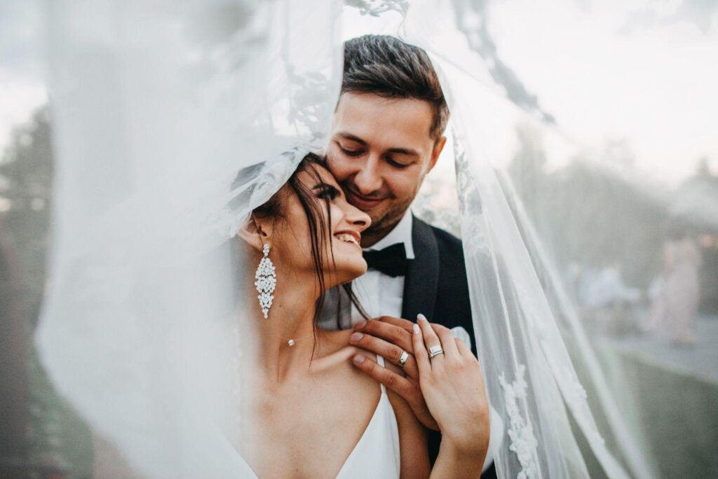 100+ Wedding Photography ideas to capture every moment 50 Romantic veil moment of couple