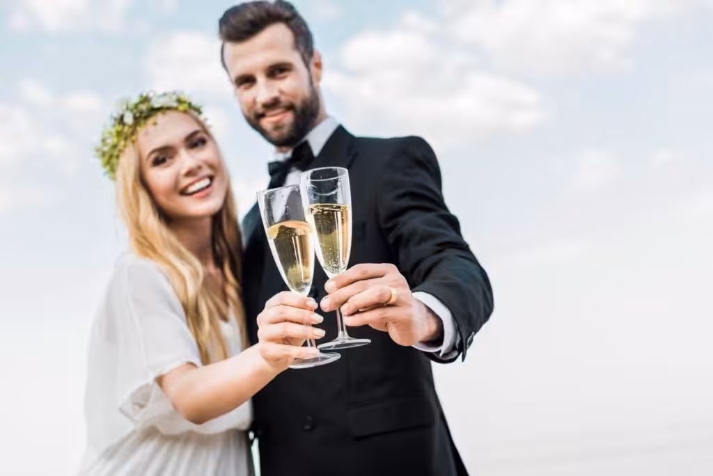 100+ Wedding Photography ideas to capture every moment 82 Couple making a celebratory toast