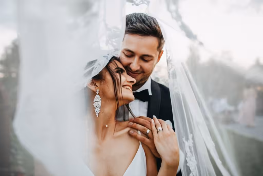 100+ Wedding Photography ideas to capture every moment 51 Romantic veil moment of couple