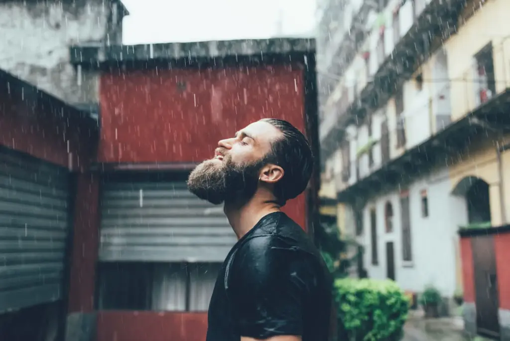 100+ Portrait Photography Ideas for Every Occasion and Style 35 Backlit rain-soaked effect