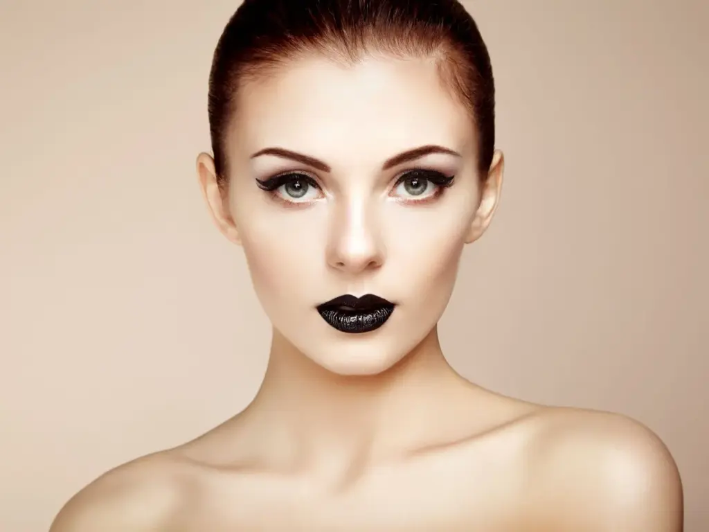 100+ Portrait Photography Ideas for Every Occasion and Style 90 Bold makeup with a strong stance