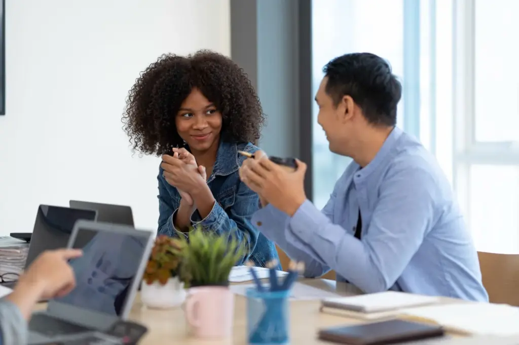 100+ Portrait Photography Ideas for Every Occasion and Style 31 Candid expression at work during a conversation
