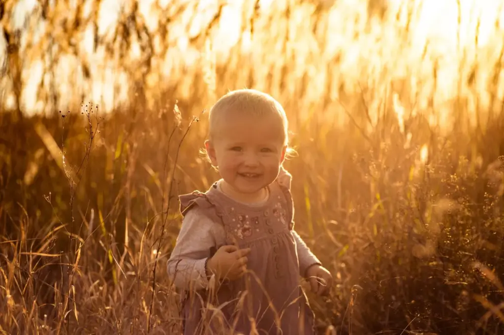 100+ Portrait Photography Ideas for Every Occasion and Style 43 Golden hour shots in tall grasses