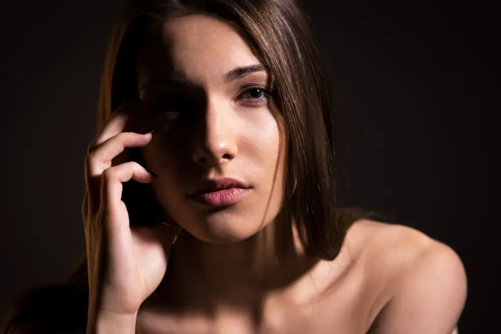 100+ Portrait Photography Ideas for Every Occasion and Style 60 Play with shadows using low-key dramatic lighting