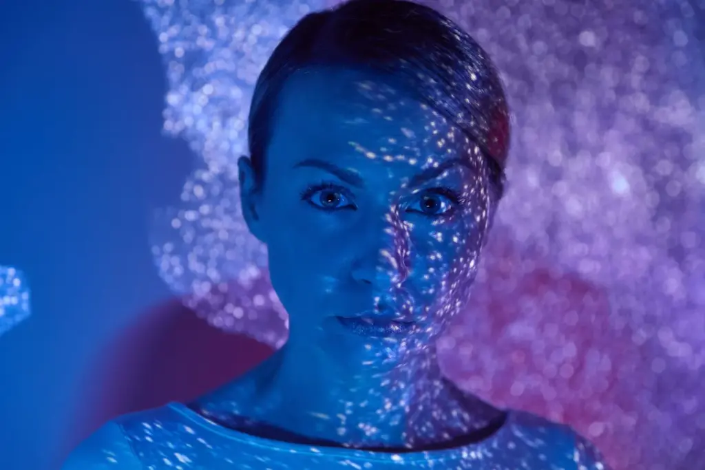 100+ Portrait Photography Ideas for Every Occasion and Style 13 Projection mapping on the face for cinematic shoots