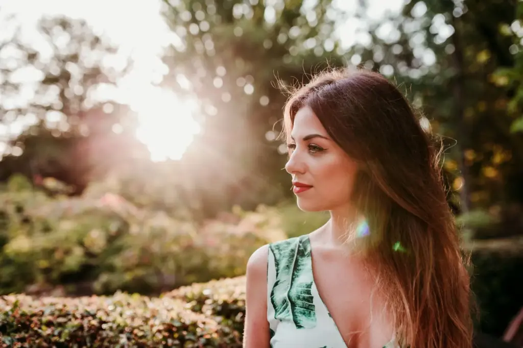 100+ Portrait Photography Ideas for Every Occasion and Style 108 Sun flare in the background