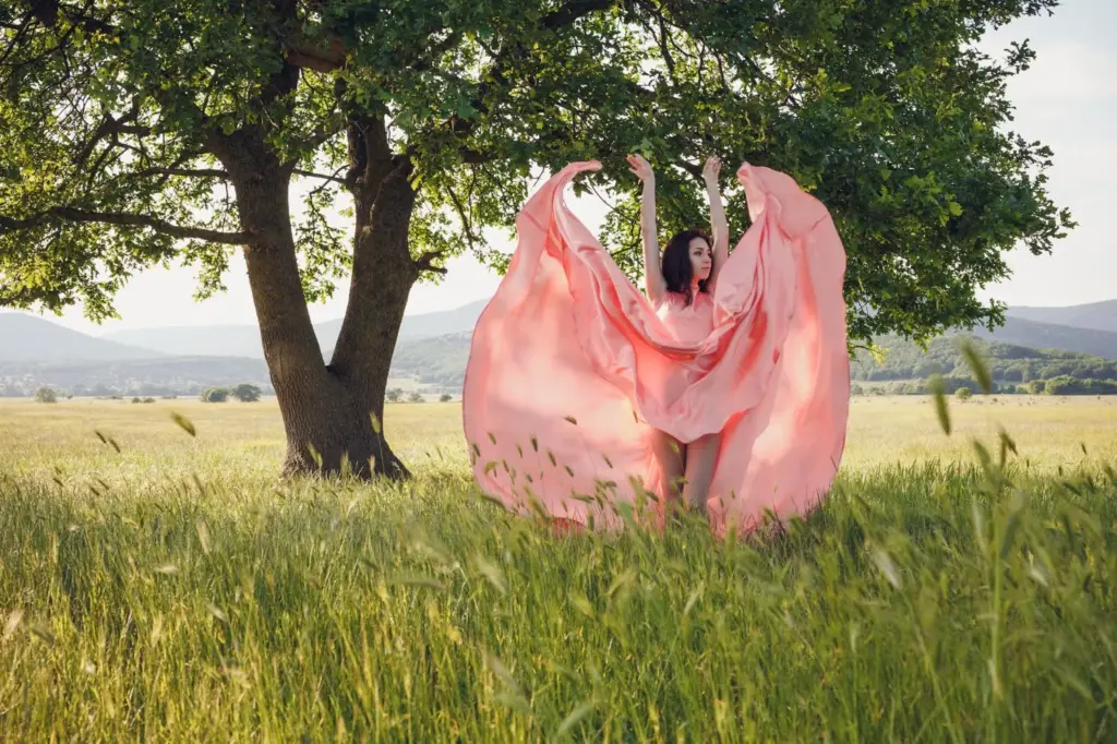 100+ Portrait Photography Ideas for Every Occasion and Style 80 Twirling with a flowing cape