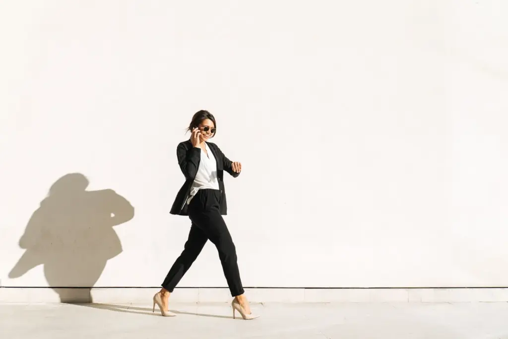 100+ Portrait Photography Ideas for Every Occasion and Style 76 Walking pose in a designer suit