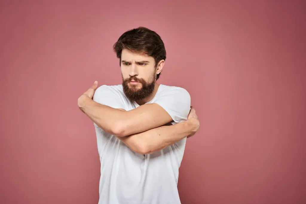 Arms crossed with chin down