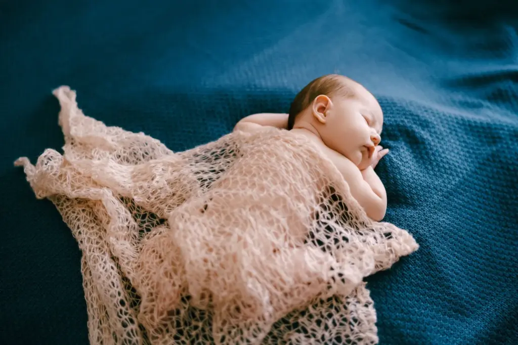 Baby girl in lace blanket