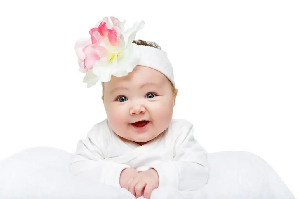 Baby girl wearing a floral tiara
