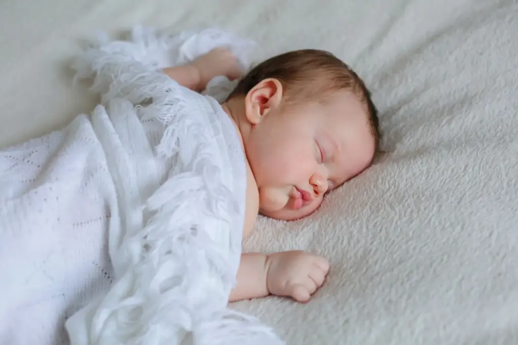 Baby sleeping sideways