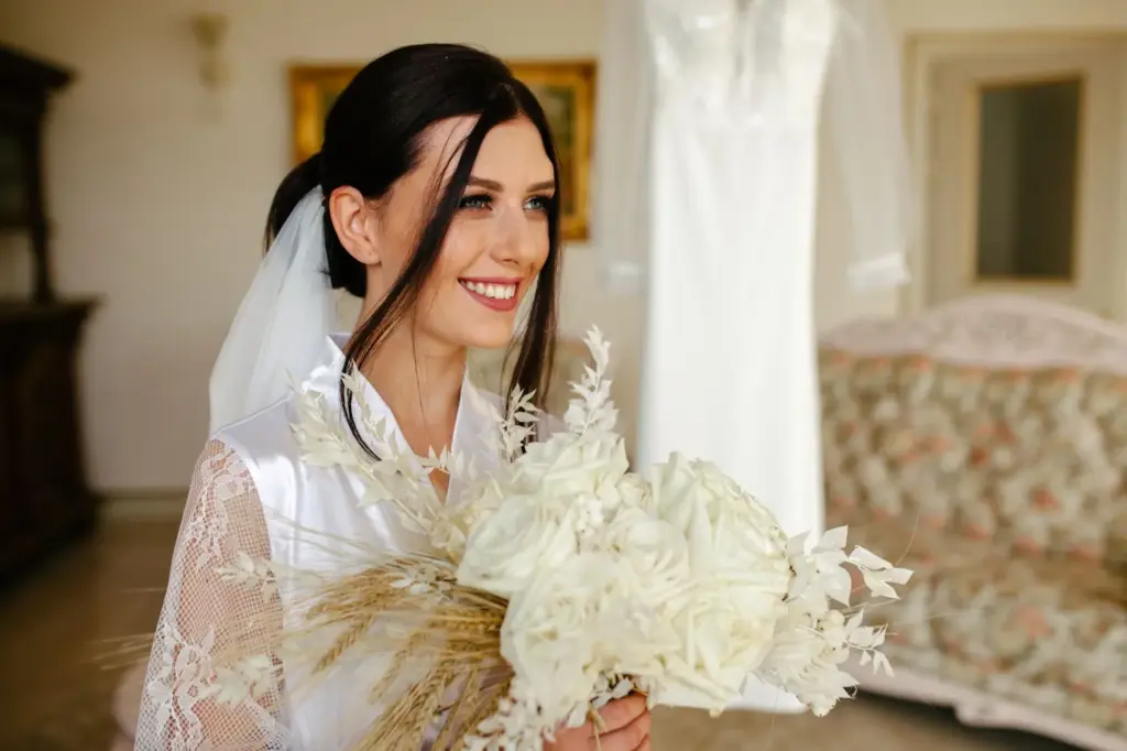 Bride smiling or tearing up before walking