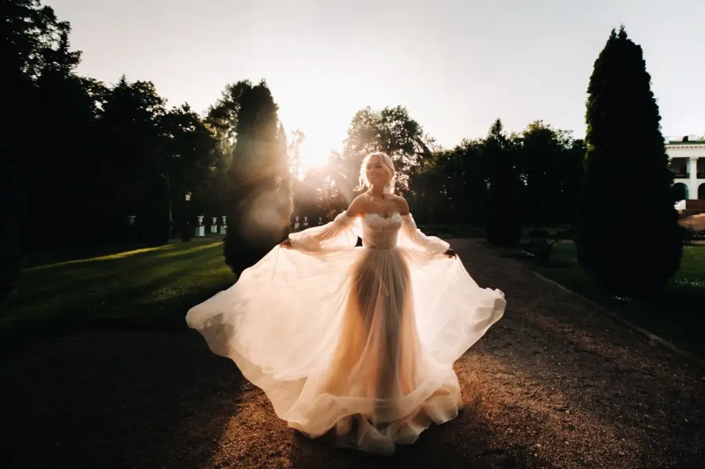 Bride twirling with sunset colors in the backdrop