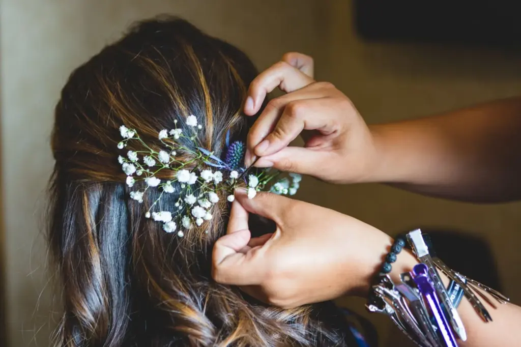 Bride’s hair detailing with cherry blossoms in it