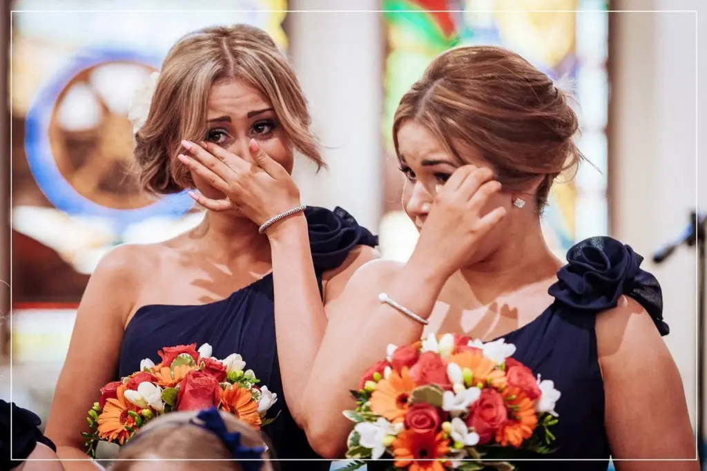 Bridesmaids holding back happy tears