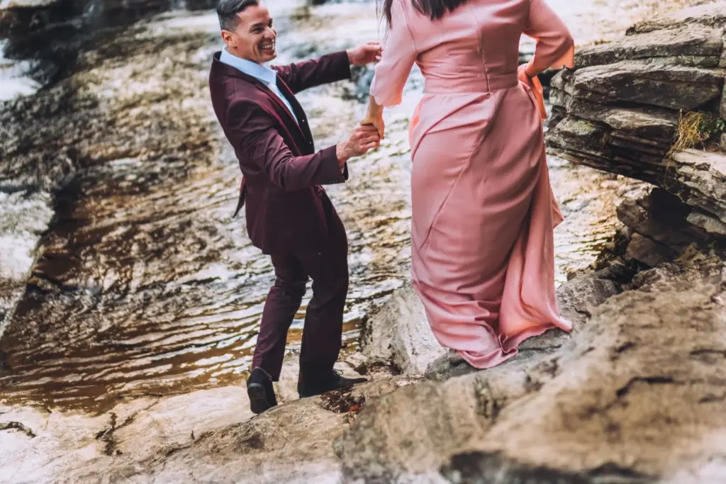 Candid laughter on a nearby rock