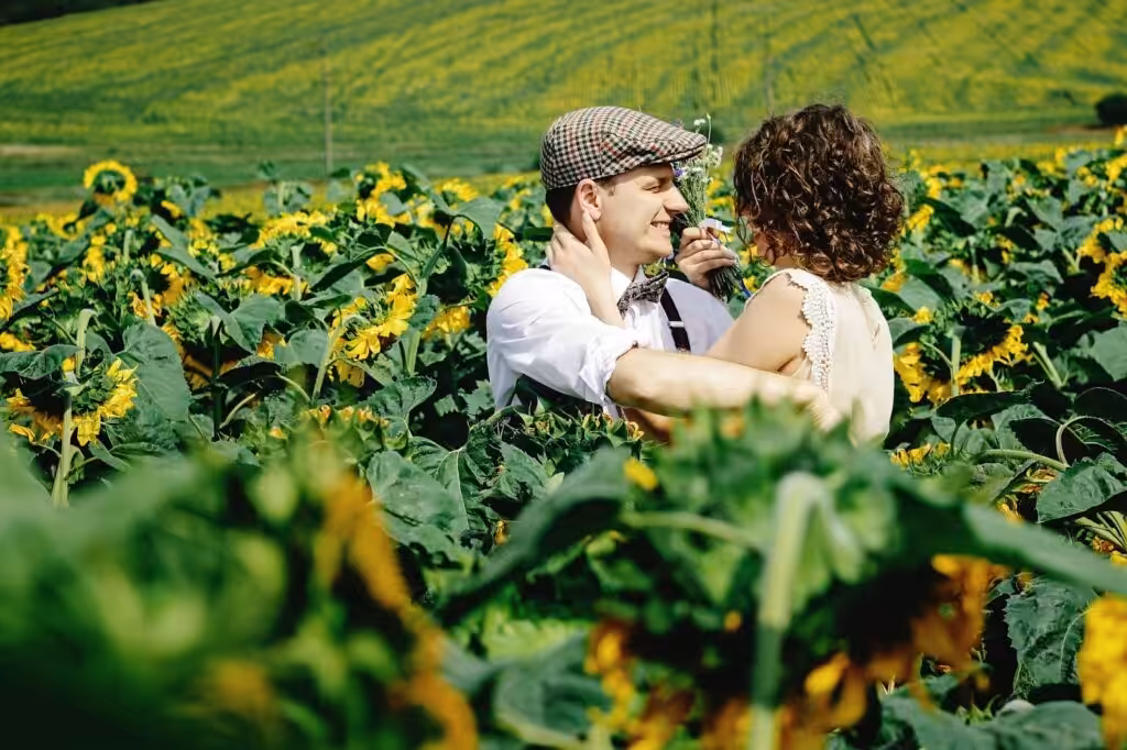20+ Magical Outdoor Wedding Photo Ideas for Every Season 108 Candid moment sitting on a blanket in the sunflower field