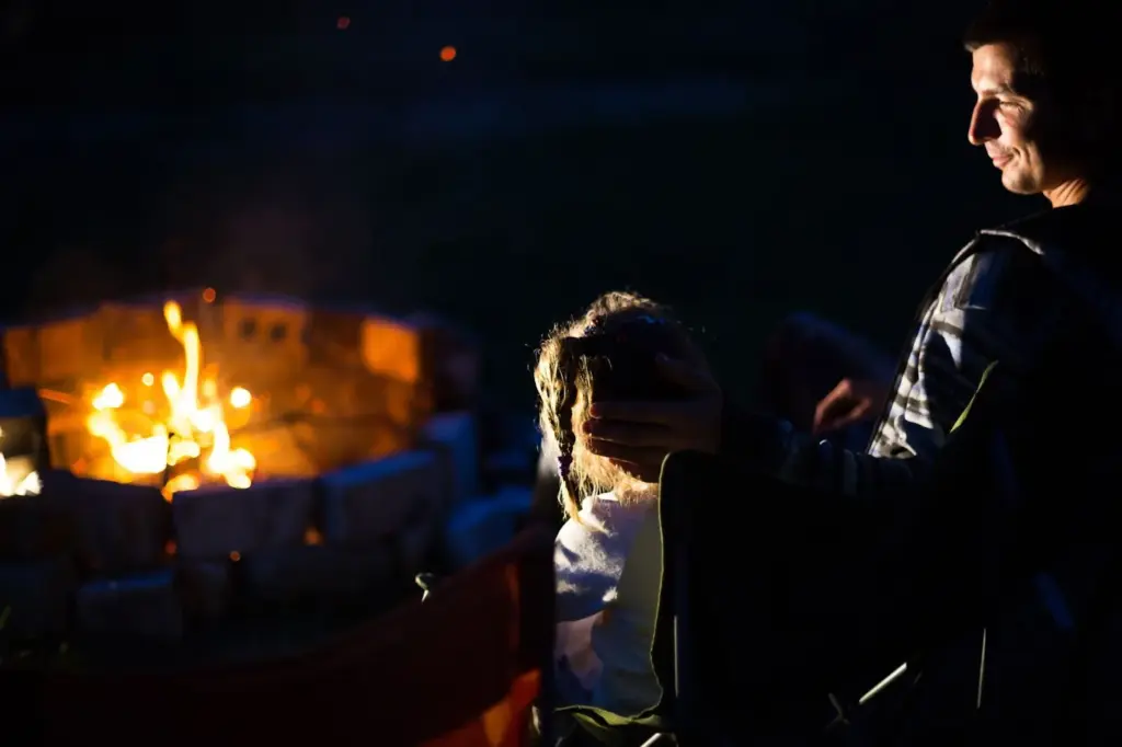 Candid moments by a campfire