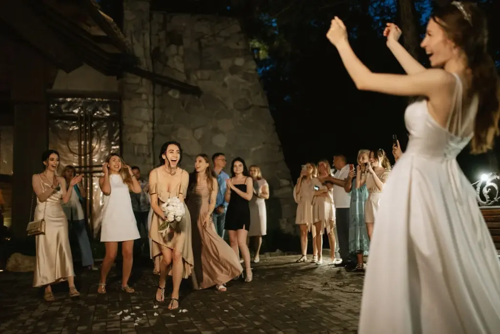 Candid of guests’ reactions as she walks by