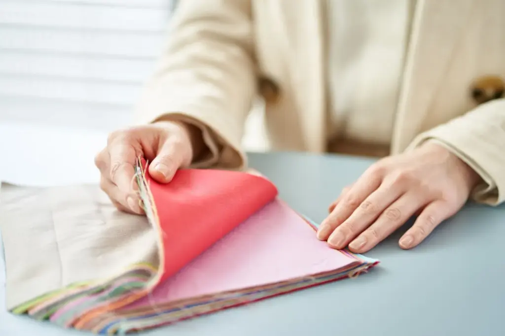 Close-up of hands holding fabric
