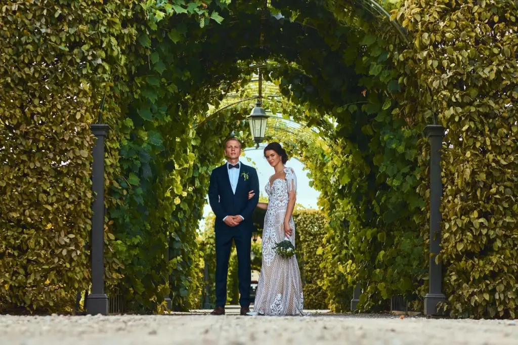 Couple framed by surrounding greenery