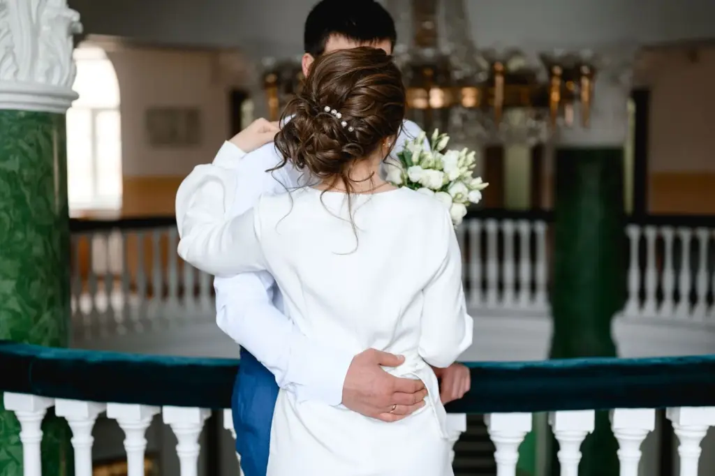 Couple hugging in royal attire