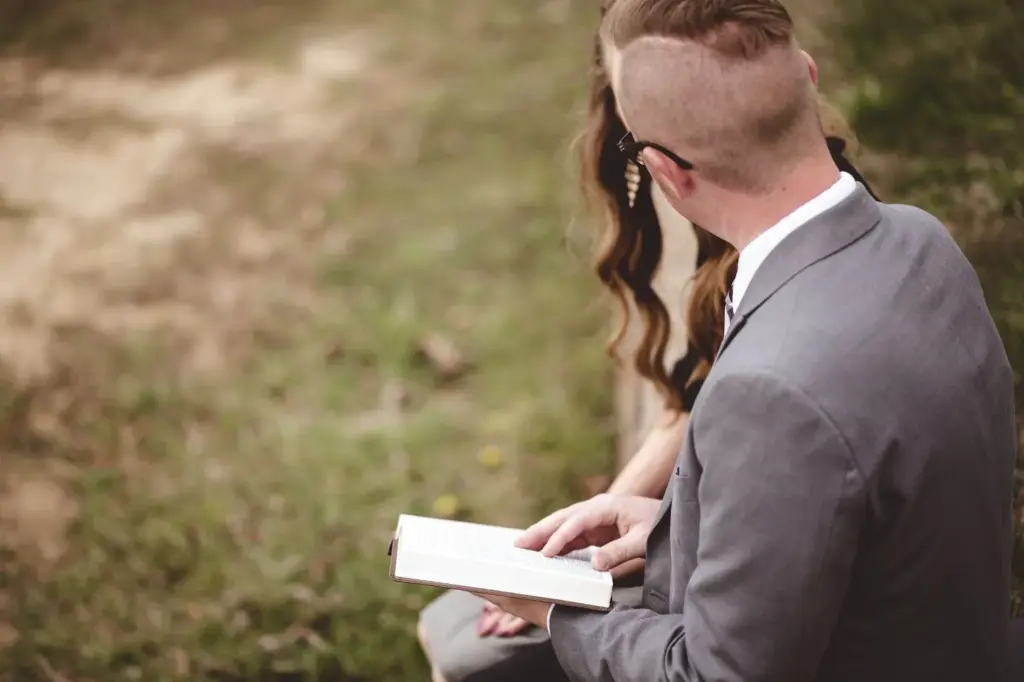 Couple reading to each other