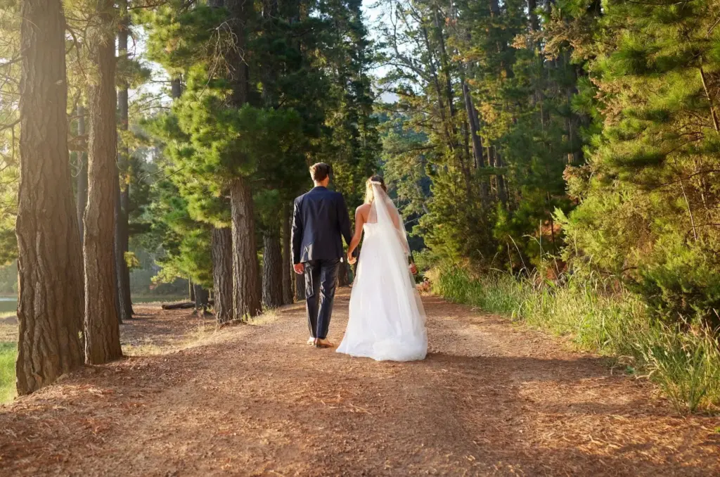 Couple walking down a dirt path