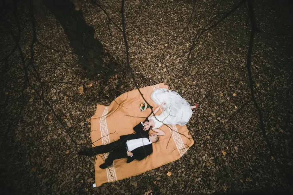 Cozy blanket snuggle in woods