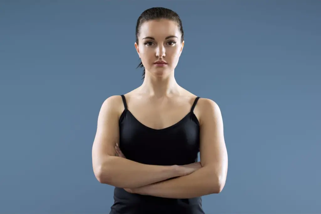 Crossed arms with strong expressions