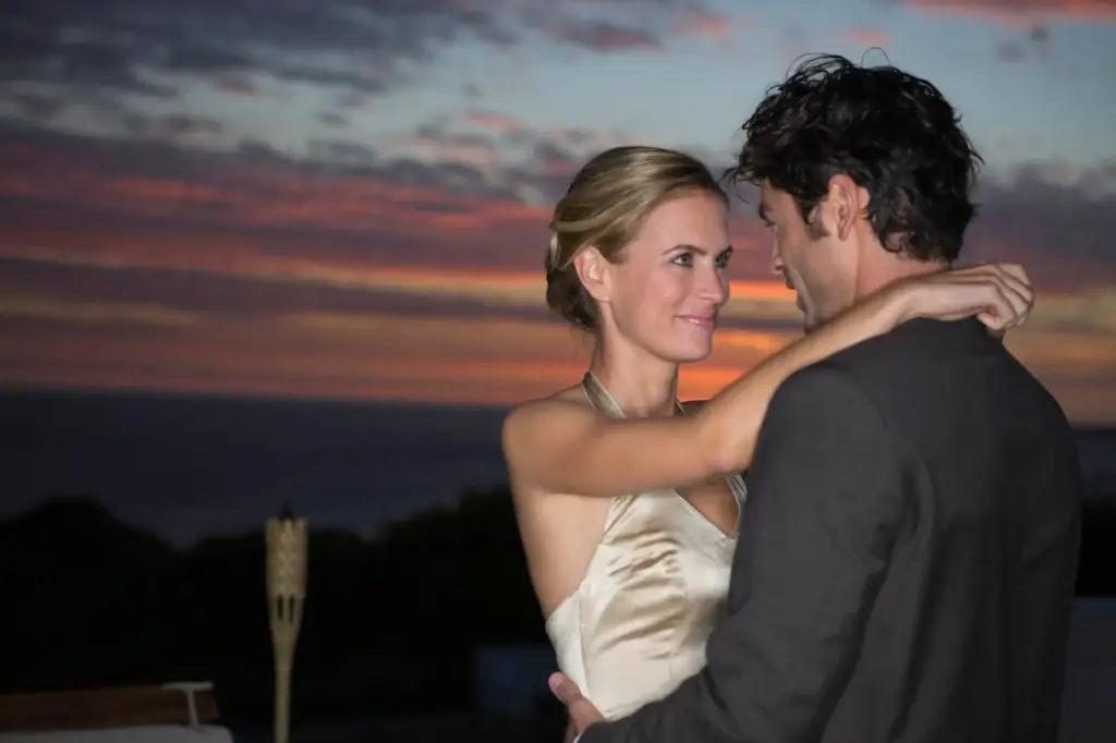 First dance bathed in warm sunset hues