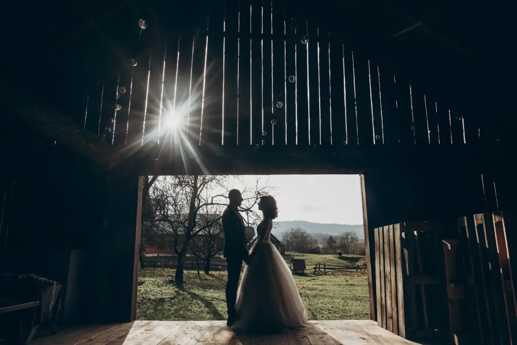 First look in a barn doorway with soft natural light