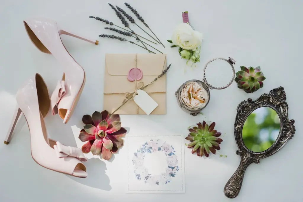 Flat lay of summer wedding invites