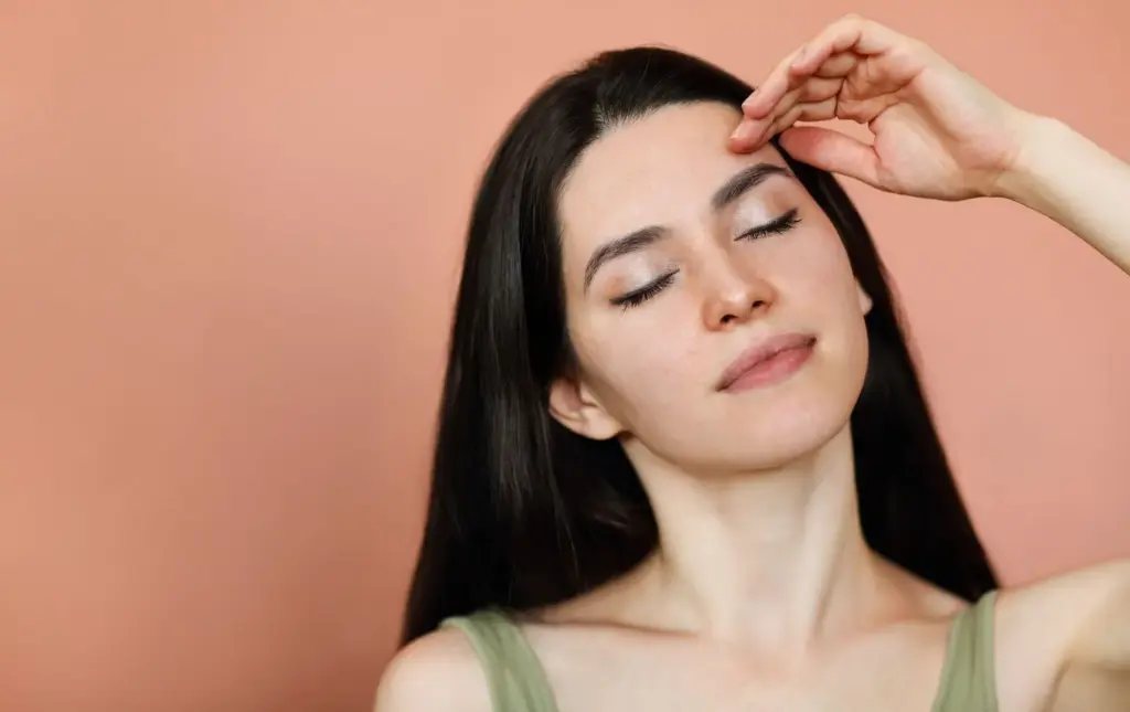 Gentle touch to the face or hair