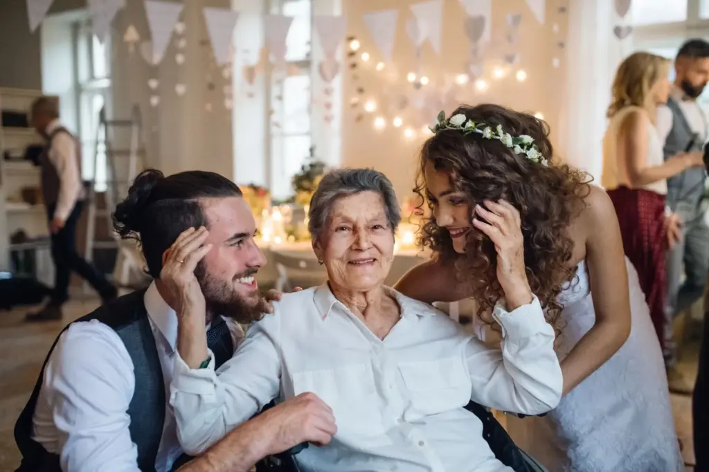 Groom sharing a warm embrace with grandparents