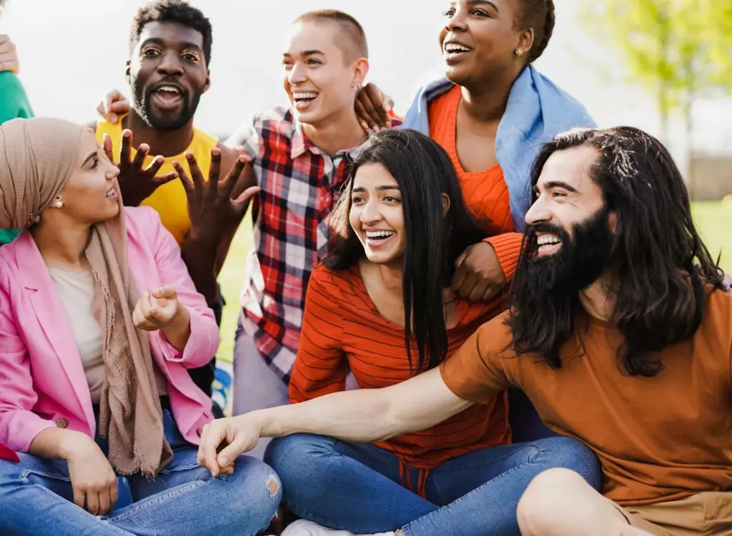 Group sitting with smiling faces