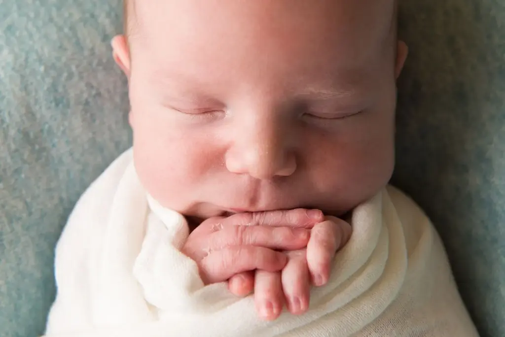 Hands holding chin pose