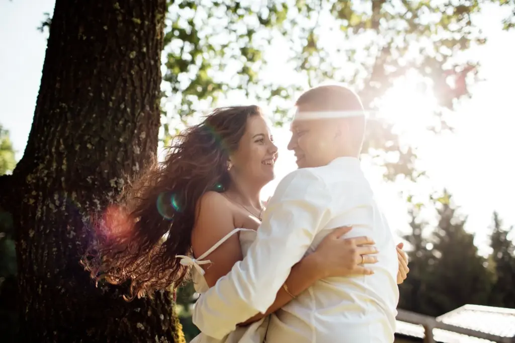 Hugging under the tree
