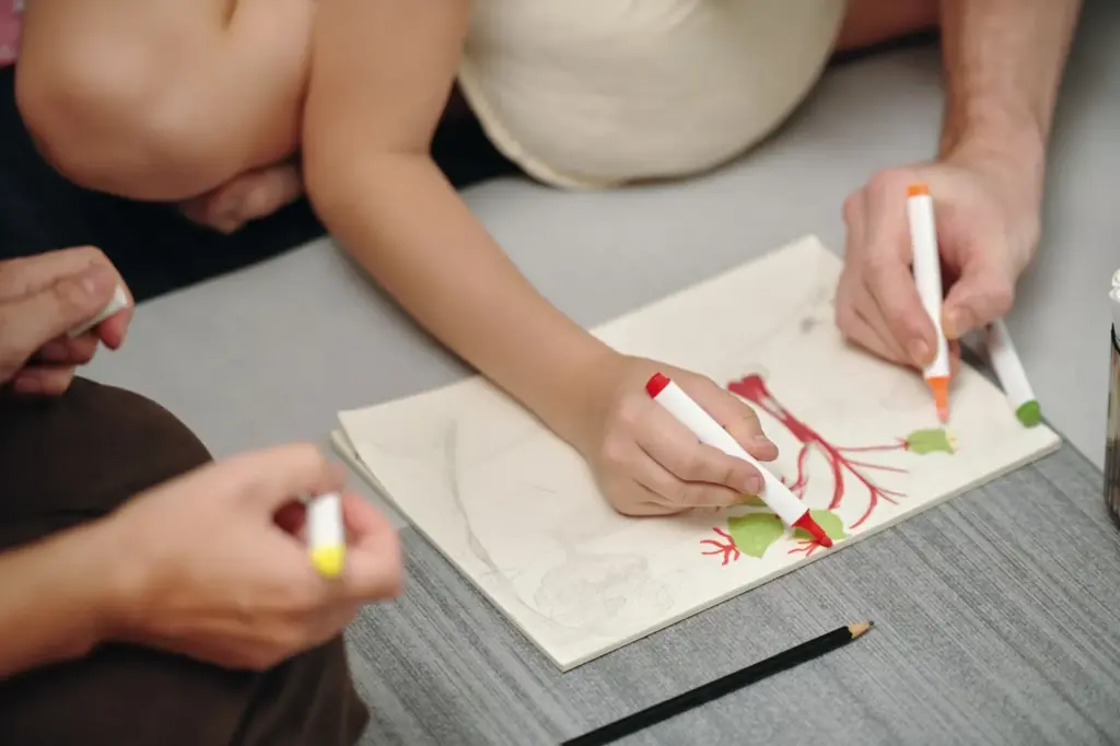 Indoor sketching or drawing together at a desk