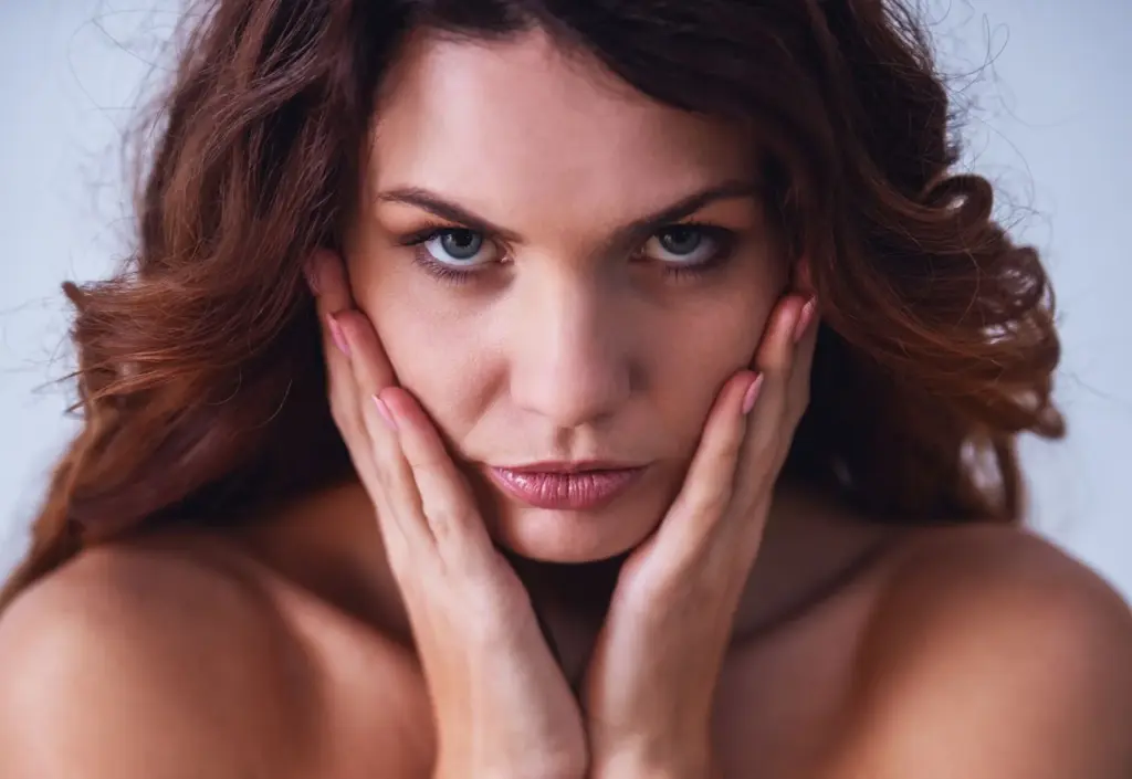 Intense stare with hands near your face