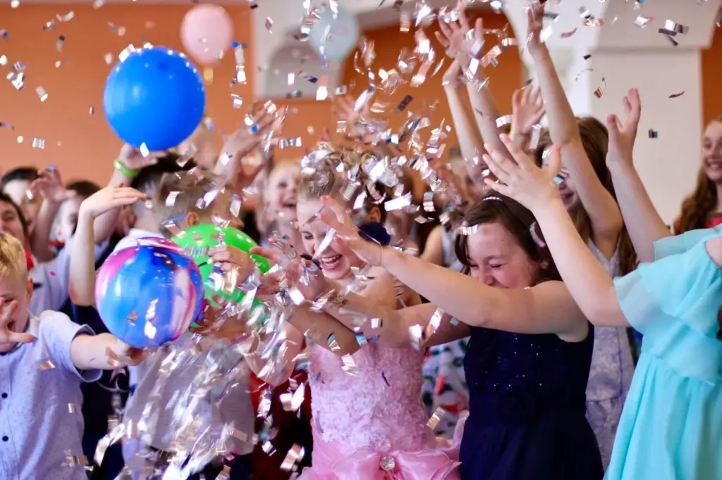 Kids jumping and spinning on the dance floor