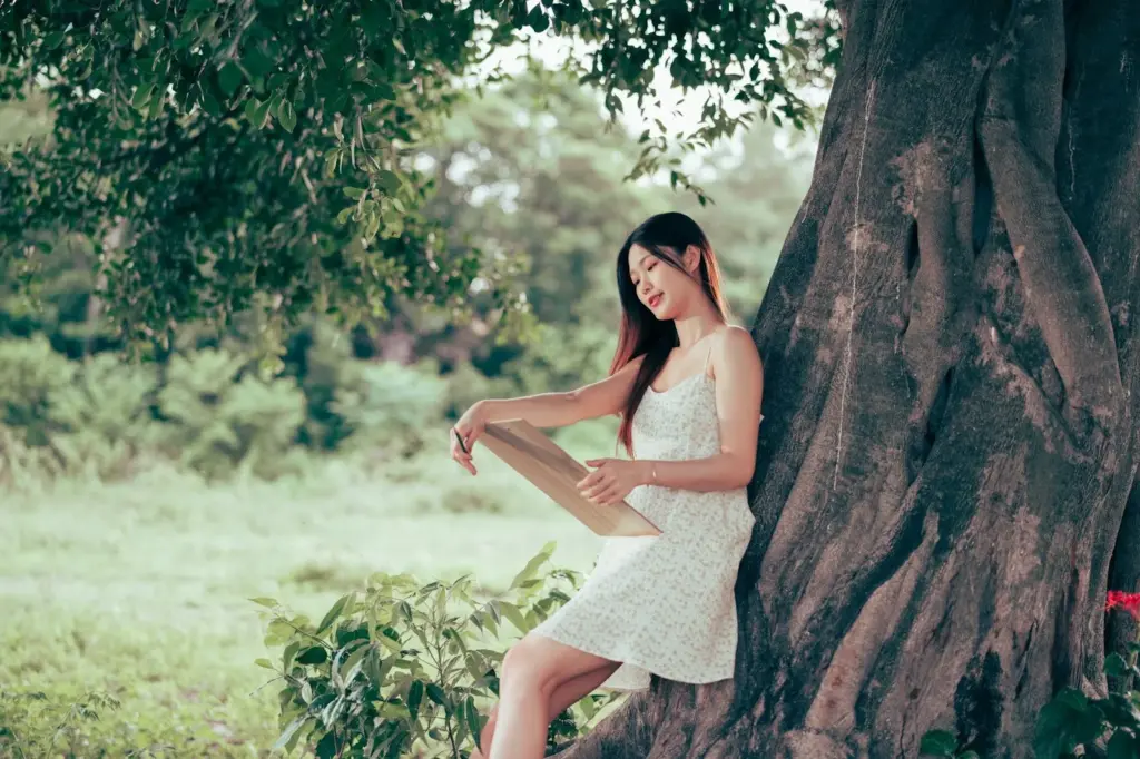 Leaning on a huge tree